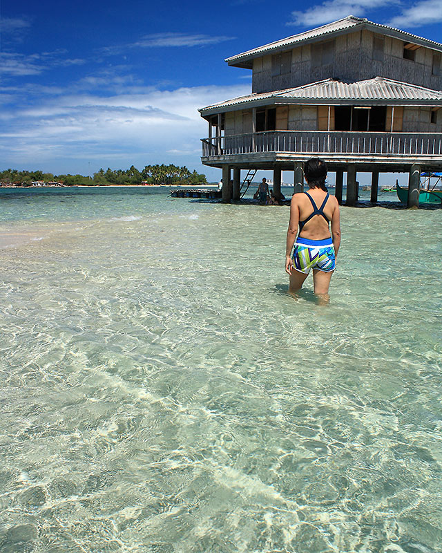 wading at the knee-deep water, Bacala sandbar and Rest House